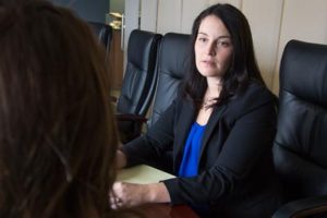 Madison Employment Discrimination Attorney Erin Sherman speaks to a client.
