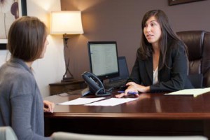 Social Security disability attorney Danielle Schroder speaks with a client.